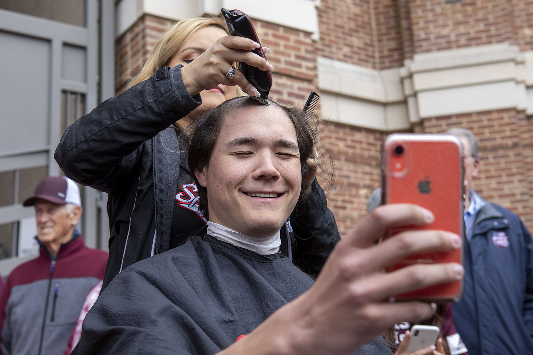 A&M baseball head shaving for cancer